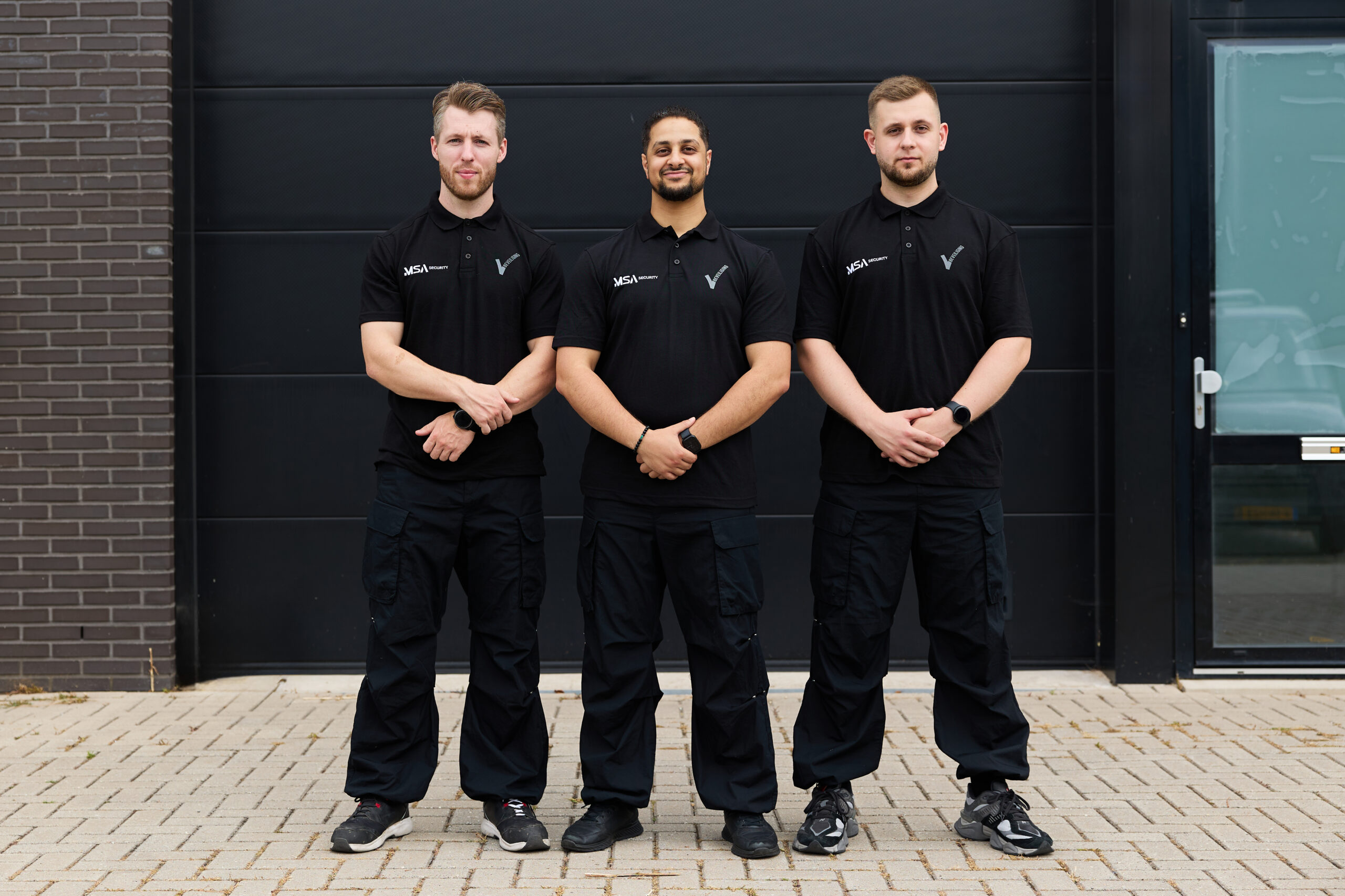 MSA bouwplaatsbeveiliging — beveiligers in polo op bouwplaats